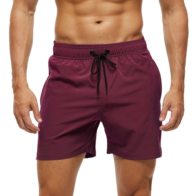 Vielseitige Herren Schwimmshorts, schnelltrocknend, mit elastischem Bund. Ideale Bademode für Sport und Entspannung am Strand.