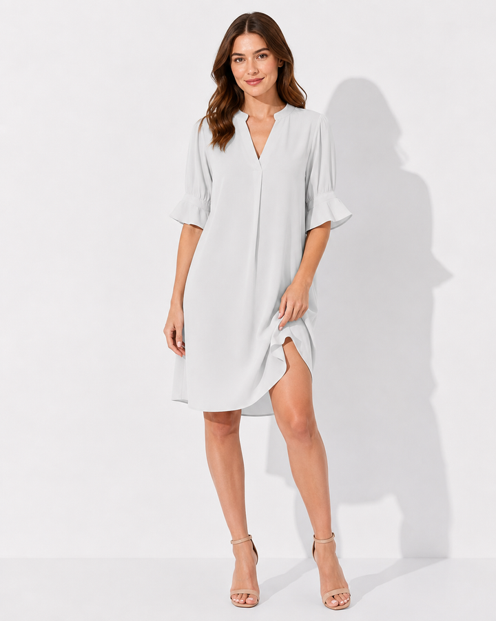 Stilvolles Damenkleid mit V-Ausschnitt und Kurzarm. Perfekt für Sommer, festliche Anlässe oder als Freizeitkleid.