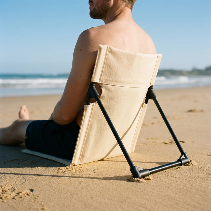 Tragbarer faltbarer Bodenstuhl mit Rückenlehne für bequemen Outdoor-Komfort. Perfekt für Camping, Strand & Picknick.