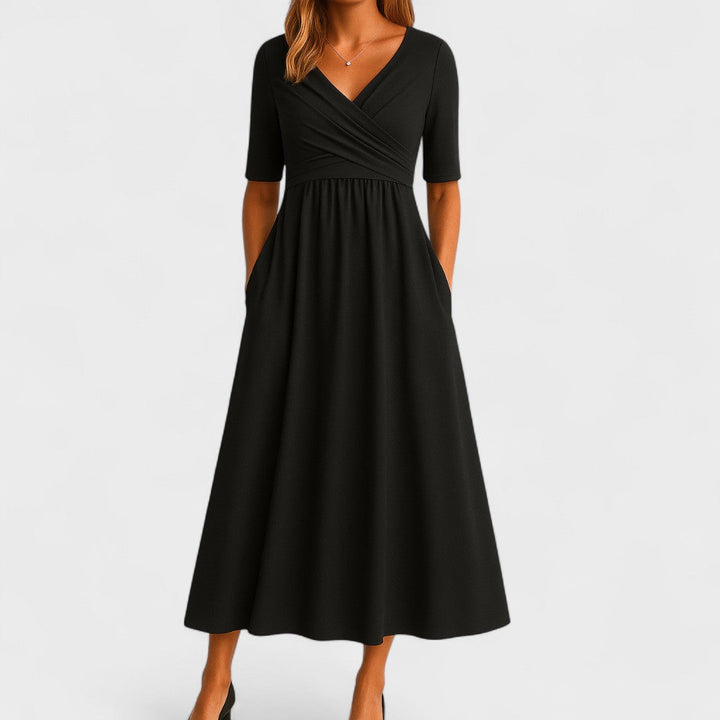 Elegantes Damen Midi Wickelkleid mit V-Ausschnitt & Halbarm. Komfortables A-Linie Kleid, ideal für Büro & festliche Anlässe.