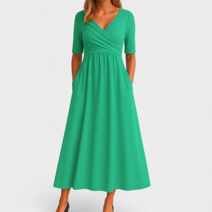 Modernes Damen Midi Wickelkleid mit V-Ausschnitt, Halbarm und Taschen. Perfektes Bürokleid oder elegantes Freizeitkleid.