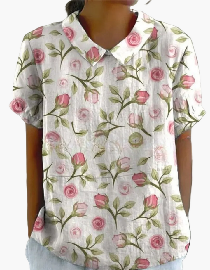 Damenbluse im eleganten Retro-Design mit lebhaftem Blumenmuster & klassischem Kragen; ein Sommer-Must-Have.