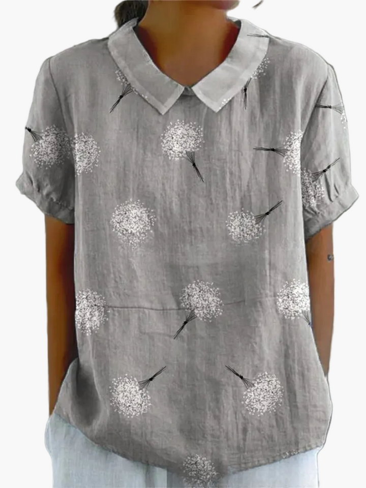 Damen Vintage Sommerbluse mit Blumenmuster, Kragen & Knopfleiste; locker geschnitten für hohen Tragekomfort.