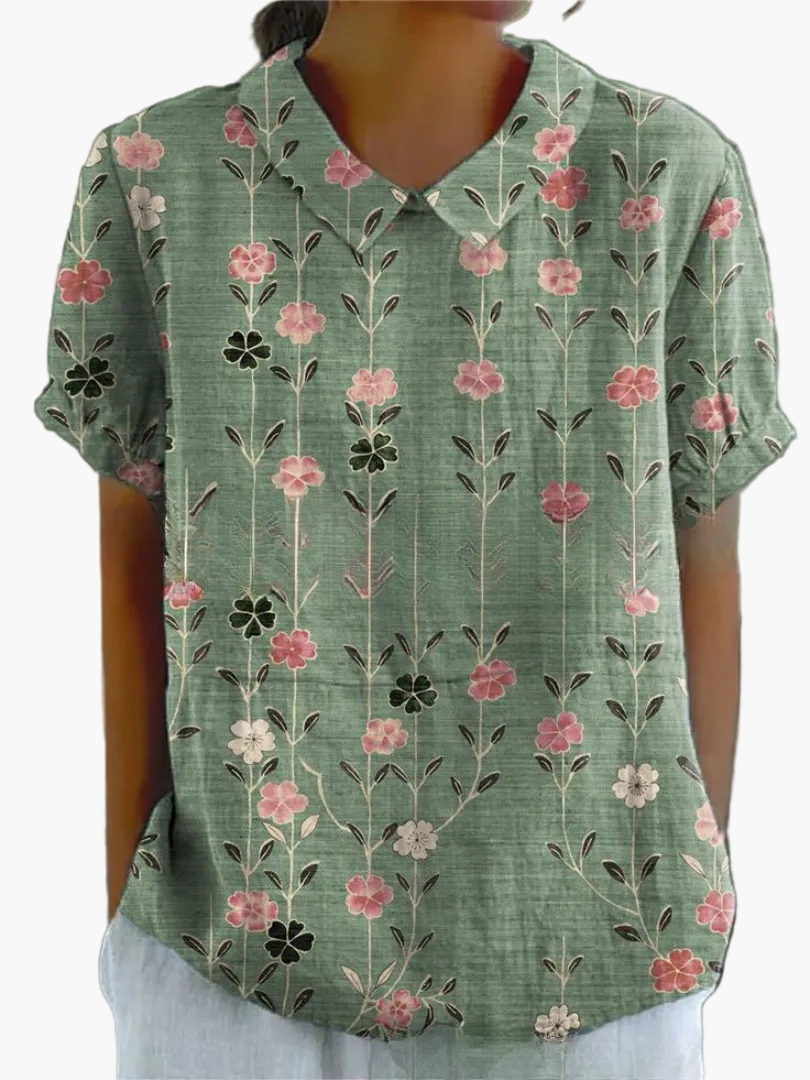 Zeitlose Damenmode: Vintage Blumenbluse mit Kragen, kurzärmlig; perfekt für einen frischen Sommer-Look.