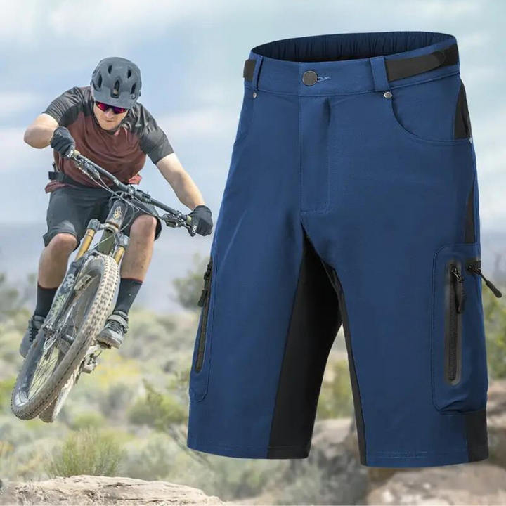 Bequeme Herren Outdoor-Shorts mit sicheren Reißverschlusstaschen und Polsterung für lange Touren.