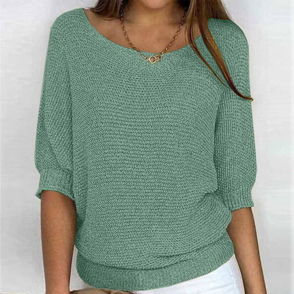 Damen Pullover mit auffälligem Kreuzmuster. Moderner und bequemer Langarm-Strick für einen stilvollen Übergangs-Look.
