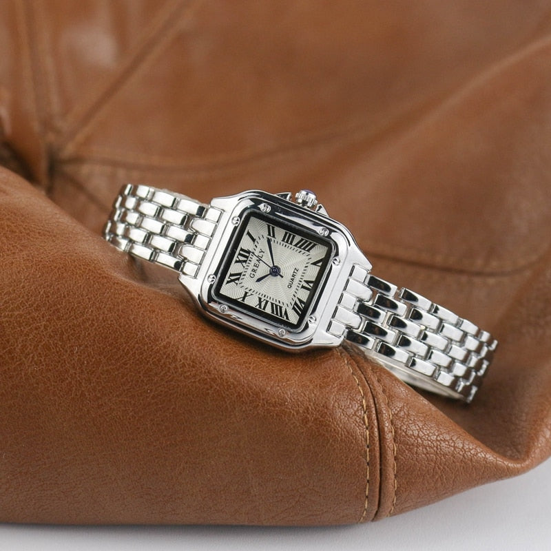 Stilvolle quadratische Gold Damenuhr, elegantes Damen Accessoire, zeitlose Armbanduhr mit präzisem Quarzwerk.