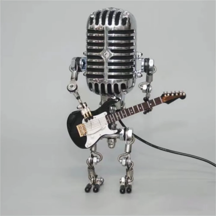 Roboterlampe Max mit Gitarre als Blickfang, schafft stimmungsvolles Licht; Retro-Tischlampe im Industriedesign.