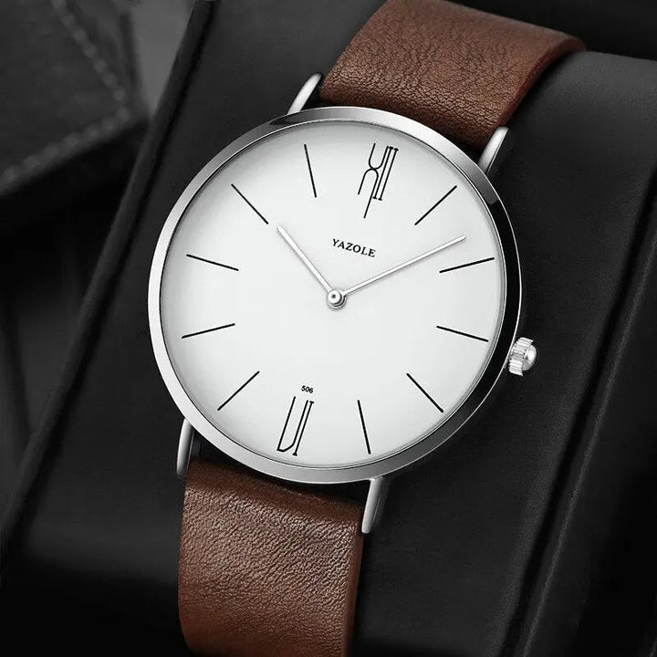 Herren Armbanduhr mit klassischem Edelstahlgehäuse und elegantem braunem Lederband, Quarzwerk.