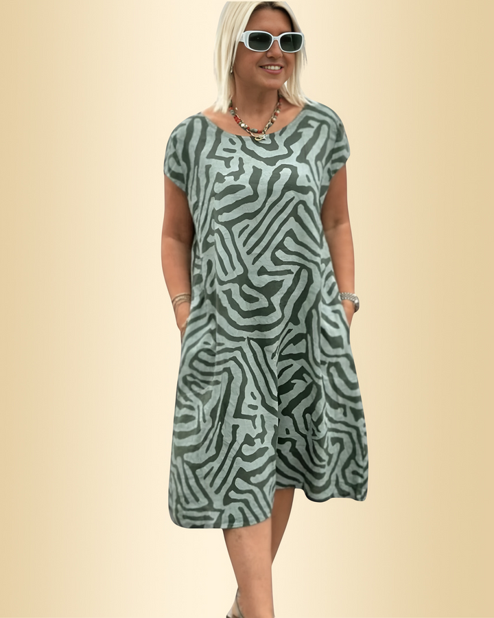 Lockeres, atmungsaktives Damenkleid für vielseitige Anlässe, ideal als Sommerkleid oder Freizeitkleid.