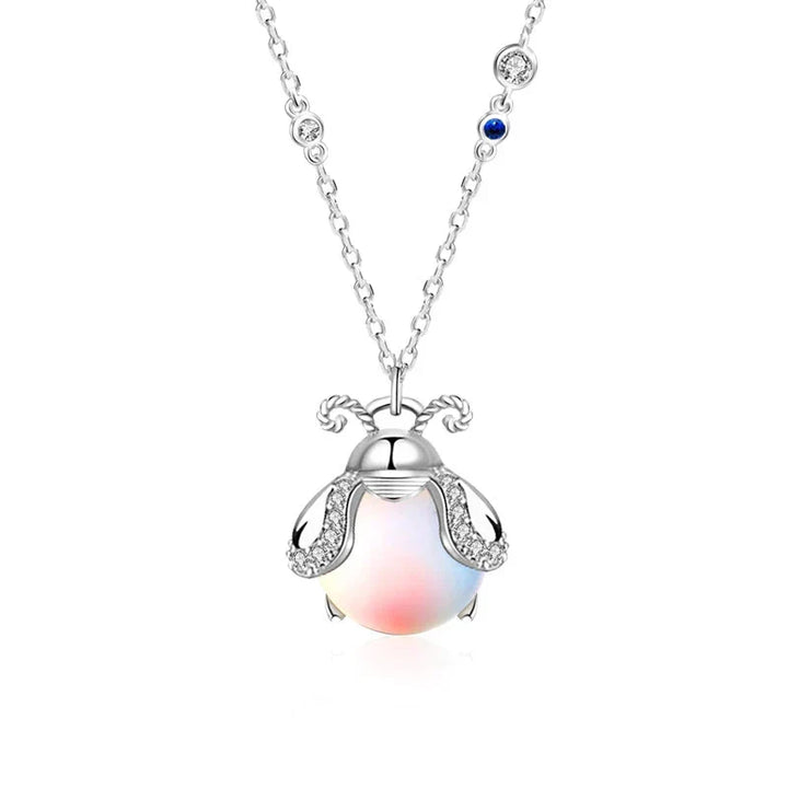 Handgefertigter Damenschmuck: Mondstein Halskette aus poliertem Silber, elegant & schlicht.