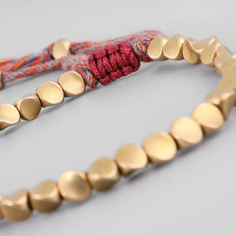 Langlebiges Seilarmband mit Kupfer-Akzenten, handgefertigt, Glücks-Schmuck, unisex Armschmuck.