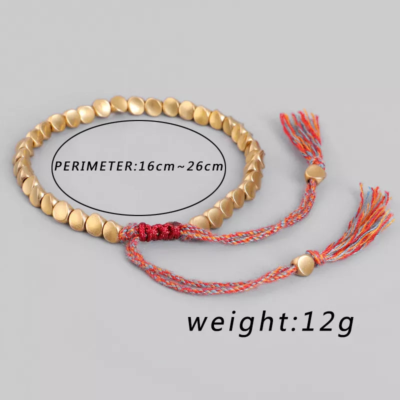 Zeitloses SpiralLuck Armband aus Kupfer & Seil, unisex Glücksschmuck, spirituelles Accessoire, handgefertigt.