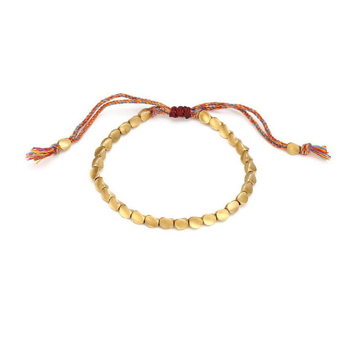 Modisches SpiralLuck Armband aus Kupfer & Seil am Handgelenk getragen, handgefertigt, unisex.