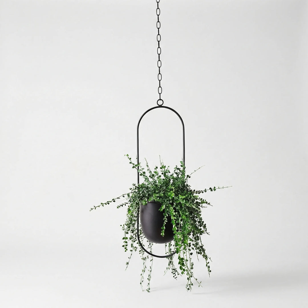 Moderner geometrischer Pflanzenhalter, hängend, ideal für Wohnzimmer und Pflanzenliebe.