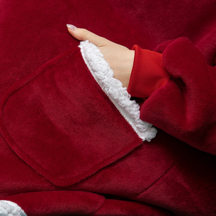 Tragbare Kuscheldecke mit Kapuze, ideal für kalte Abende und gemütliche Stunden.