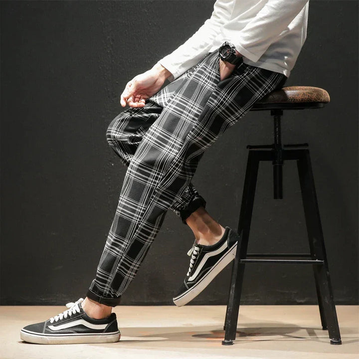 Herren Karohose mit lockerem Schnitt & elastischem Bund. Bequeme Business-Freizeithose für Alltag & Reisen.
