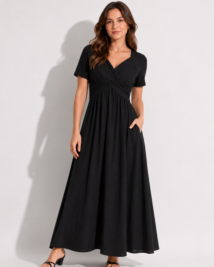 Nahaufnahme des komfortablen Stoffes vom eleganten Damen Midikleid, ideal für Sommer oder festliche Anlässe.