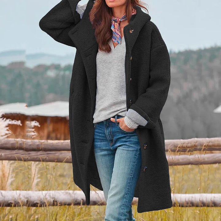 Eleganter langer Damen Wintermantel mit Kapuze. Perfekt für stilvolle Wintermode, Freizeit und Outdoor-Aktivitäten.