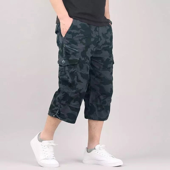 Robuste Herren Outdoor Cargo 3/4 Hose im Relaxed Fit, ideal für Wanderungen und Abenteuer.