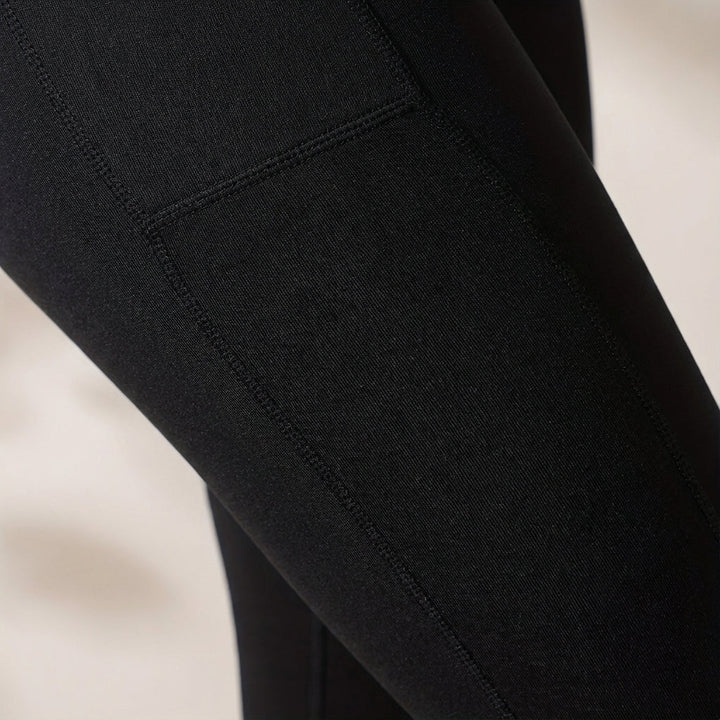 Damen Fitnessleggings Teresa mit hoher Taille aus Stretch-Material für maximale Bewegungsfreiheit beim Sport.