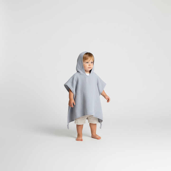 Kinder Kapuzenponcho: Saugstarker Musselin-Wrap für einfaches Abtrocknen. Kein Verrutschen, ideal für aktive Kinder.