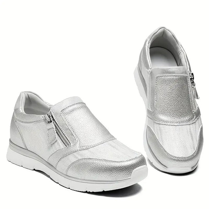 Eleganter, sportlicher Damen Komfort Sneaker mit atmungsaktivem Design und stoßdämpfender Laufsohle; ideal für Alltag.