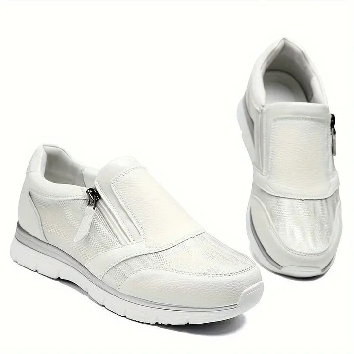 Damen Komfort Sneaker mit stoßdämpfender Sohle für bequemen Alltag; ideal für Freizeit und Sport.