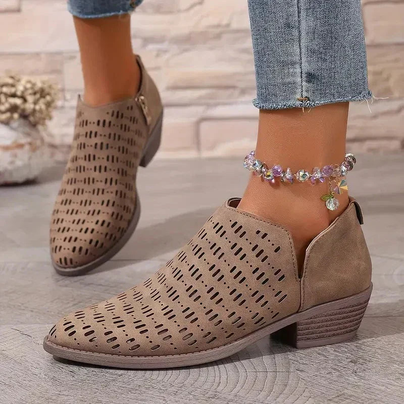 Komfortable Damenstiefel mit praktischem Reißverschluss, ideal als rutschfeste und atmungsaktive Alltagsschuhe.