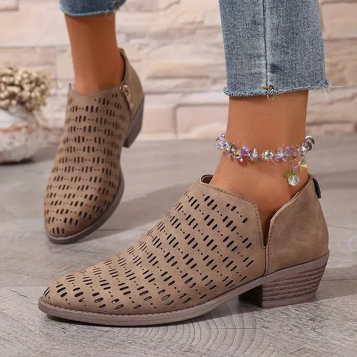 Komfortable Damenstiefel mit praktischem Reißverschluss, ideal als rutschfeste und atmungsaktive Alltagsschuhe.