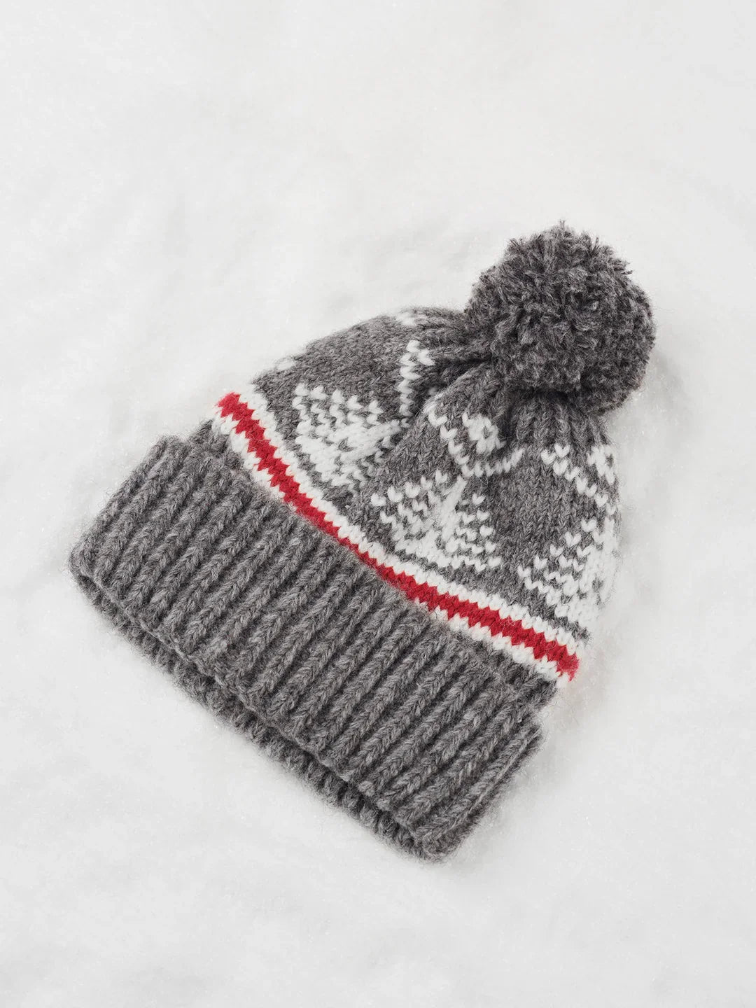 Warme, stilvolle Damen-Strickmütze für kalte Wintertage; kuschelige Beanie-Kopfbedeckung in moderner Optik.