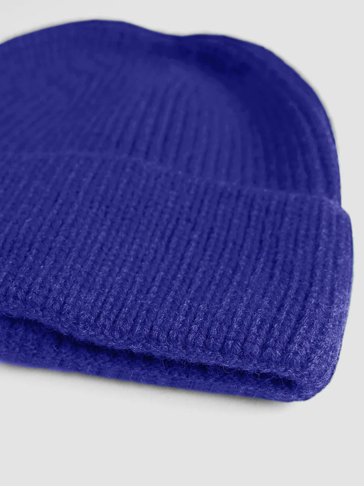 Damen Wintermütze: Eine gemütliche Strickbeanie, die Komfort und modischen Stil vereint.