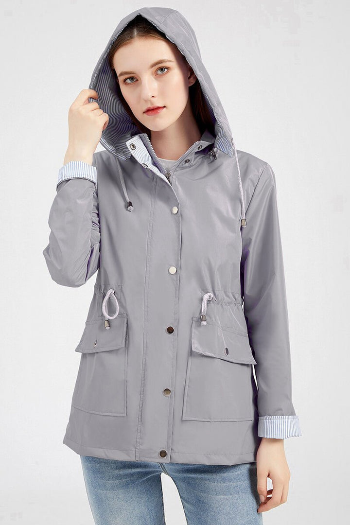 Stilvolle Damen Übergangsjacke mit Kapuze & Kordelzug, perfekt für Freizeit & Outdoor.