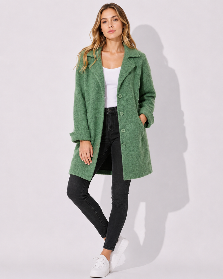 Zeitloser schwarzer Damen-Übergangsmantel mit Reverskragen. Langer, lässiger Schnitt für Frühling & Herbst Mode.