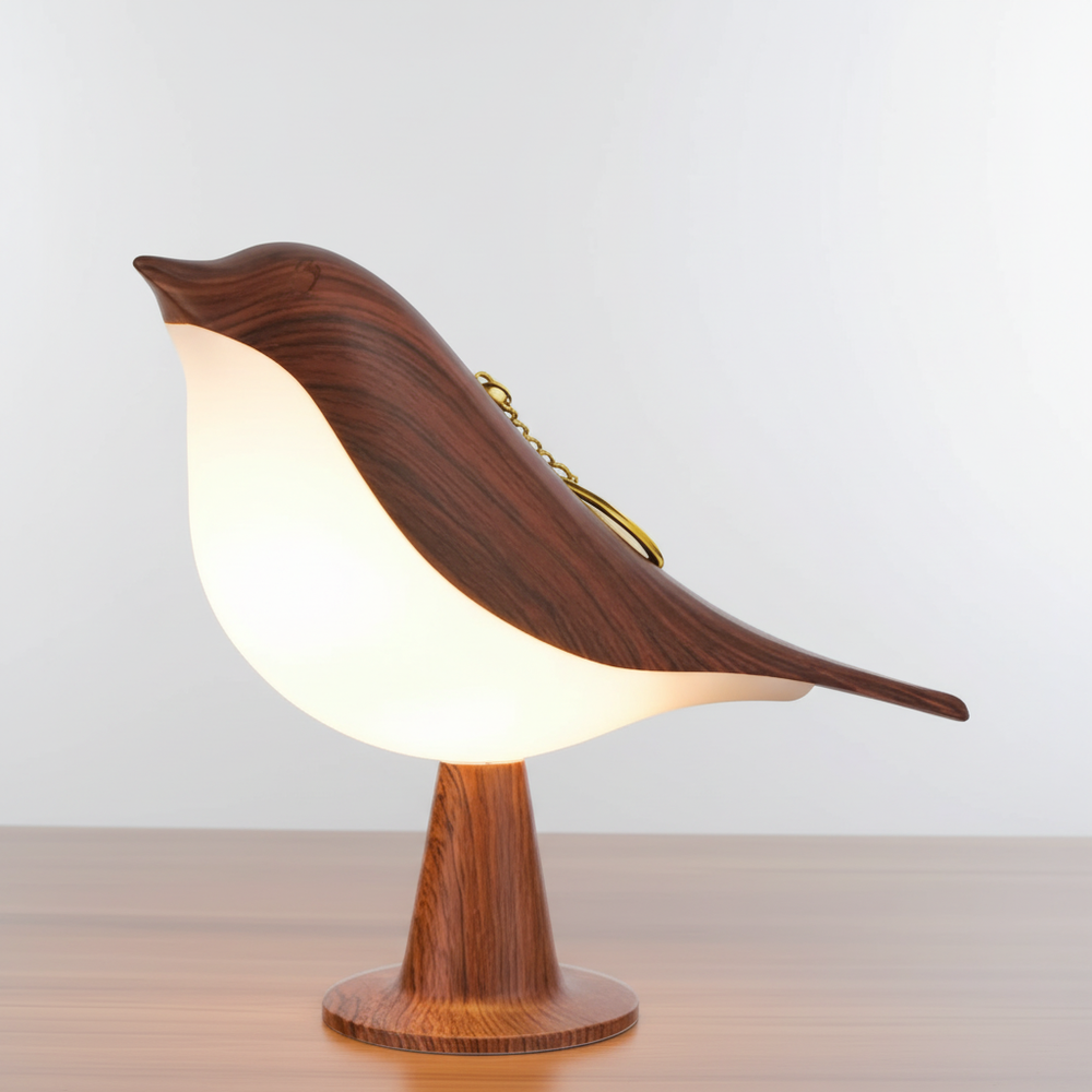 Elegante kabellose Vogellampe FeatherLuxe, warmweißes LED Stimmungslicht für Nachttisch oder Tischdekoration.