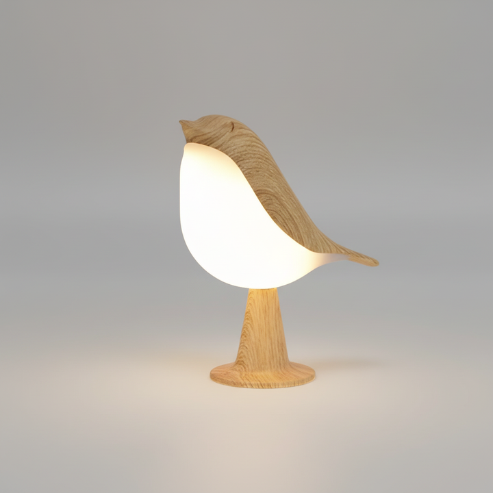 Kabellose LED Nachttischlampe FeatherLuxe, Vogellicht mit warmweißem Licht für gemütliches Ambiente im Schlafzimmer.