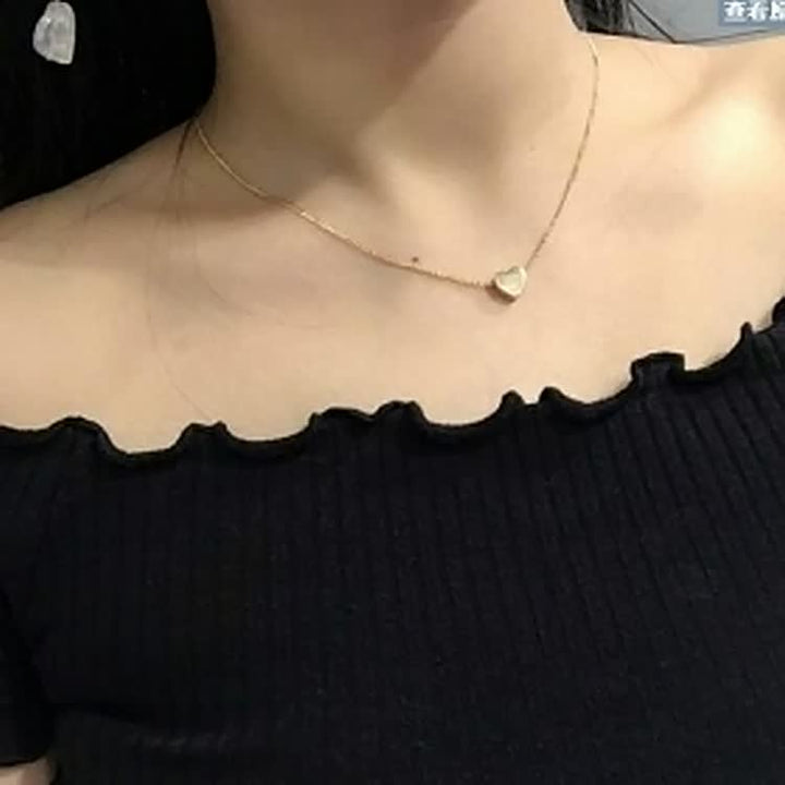Romantische Herzkette als Geschenk für Frauen, vergoldet, mit glänzendem Herzsymbol.