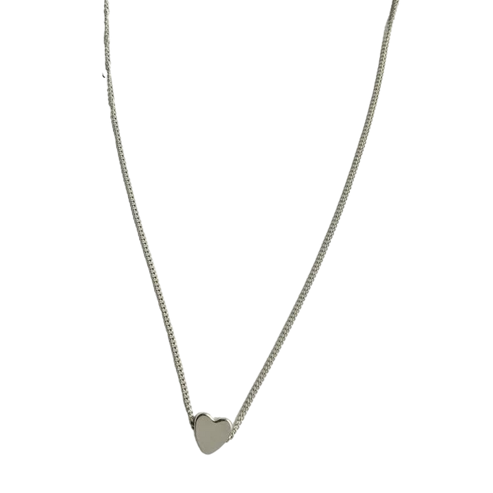 Herzkette Gold für Damen, getragen an einem eleganten Hals, betont die Schönheit des Schmucks.