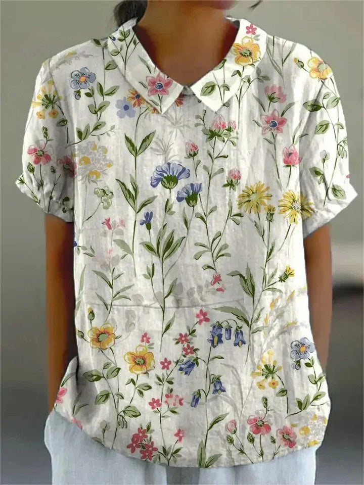 Damen Bluse mit elegantem Blumenmuster, leicht und locker geschnitten, ideal für Frühling & Sommer.