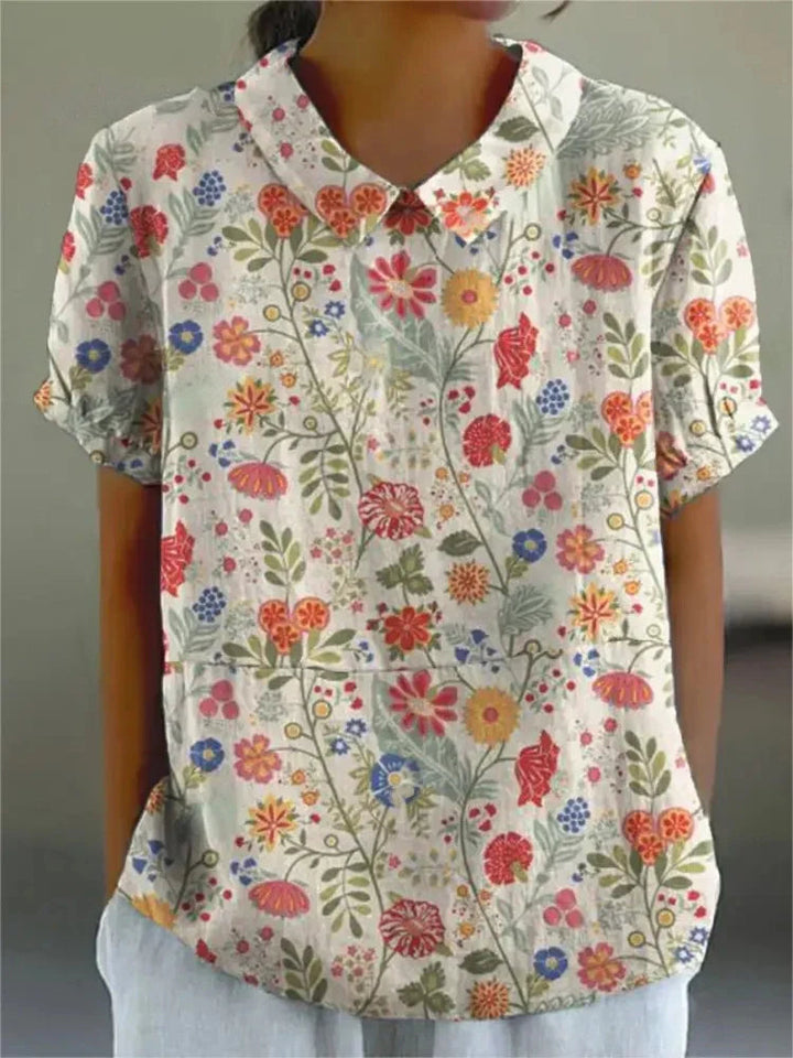 Stilvolle Damen Sommerbluse mit buntem Blumenmuster, leicht, locker geschnitten, elegant & bequem für Freizeit.