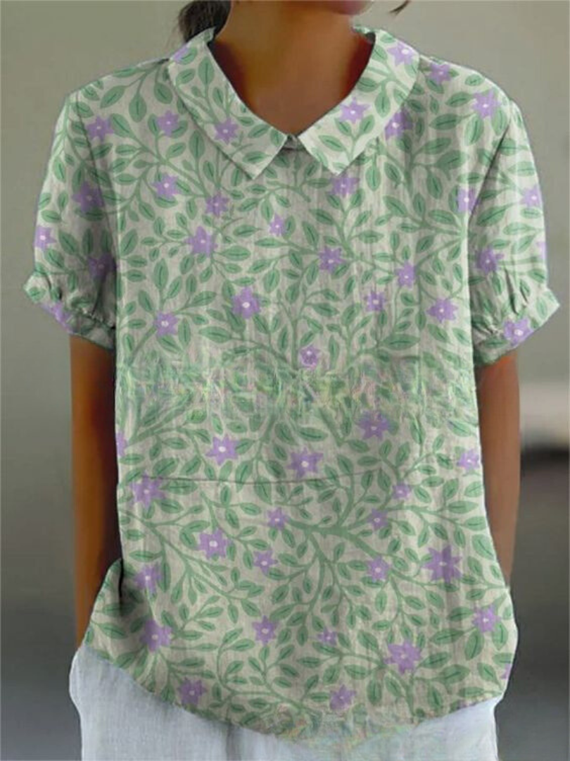 Lockere mintgrüne Damenbluse mit floralem Print, leicht & luftig, ideal für warme Sommertage.