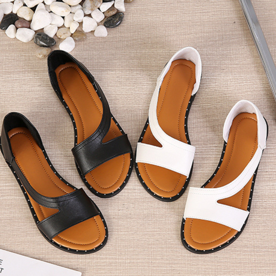 Komfortable flache Damen Sandalen, atmungsaktiv & leicht. Ideal als Alltagsschuhe oder für sommerliche Spaziergänge.