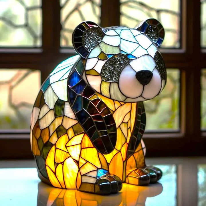 Stilvolle AnimalGlow Nachttischlampe mit buntem Tiermotiv aus Buntglas.