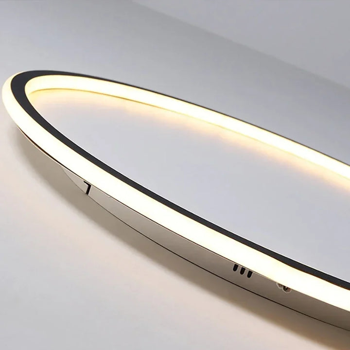 Minimalistische LED-Deckenleuchte, dimmbar, Skandi-Stil, schafft angenehmes Ambiente.