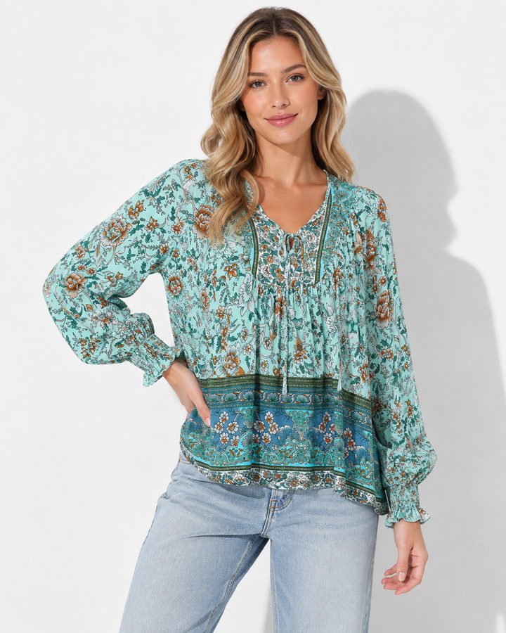 Elegantes Damen Langarmshirt mit V-Ausschnitt & Krawattendetail. Bedrucktes Oberteil für Business & Freizeit.