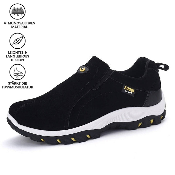 Ein Paar schwarze Herren Luxe Steppschuhe, bereit für ultimative Entspannung und ermüdungsfreie Füße.