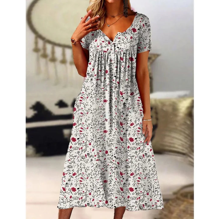 Alltagstaugliches Damen A-Linienkleid mit Blumenmuster, V-Ausschnitt, Kurzarm & bequemen Taschen; ideal für Freizeit.