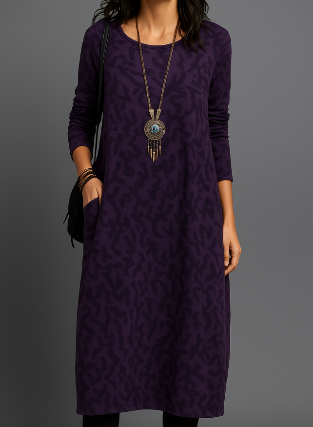 Schickes Damen Midikleid mit elegantem Muster, langen Ärmeln und funktionalen Seitentaschen. Freizeit-Chic.