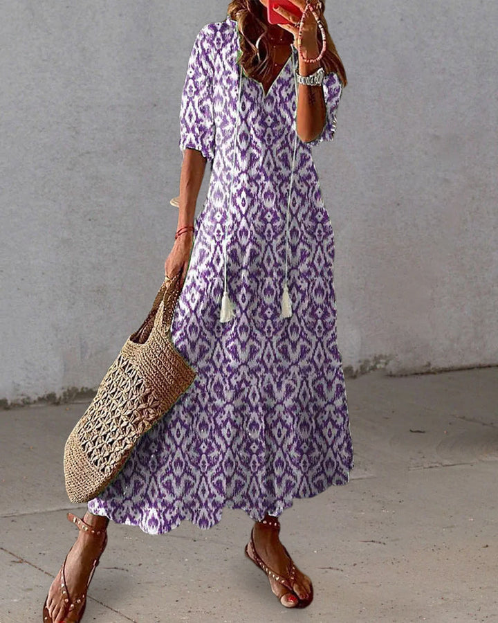 Fließendes Damen Boho Midikleid in A-Linie, elegant und bequem, ideal für Strand und Freizeit im Sommer.
