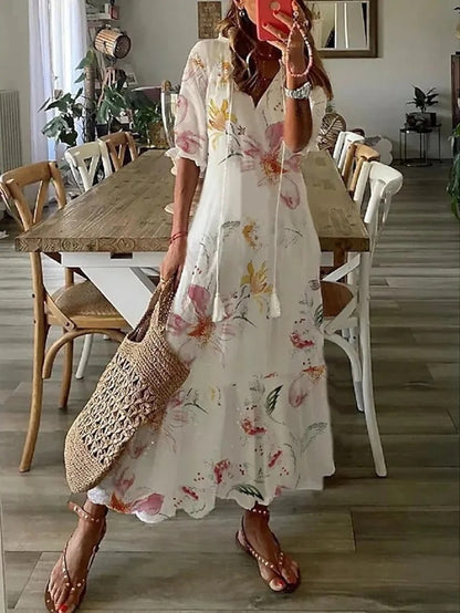 Stilvolles Damen Boho Midikleid mit V-Ausschnitt und fließender A-Linie, ein trendiges Sommer- und Freizeitkleid.
